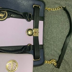 Luxurious lavender hand bag with matching wallet. Lightly used.